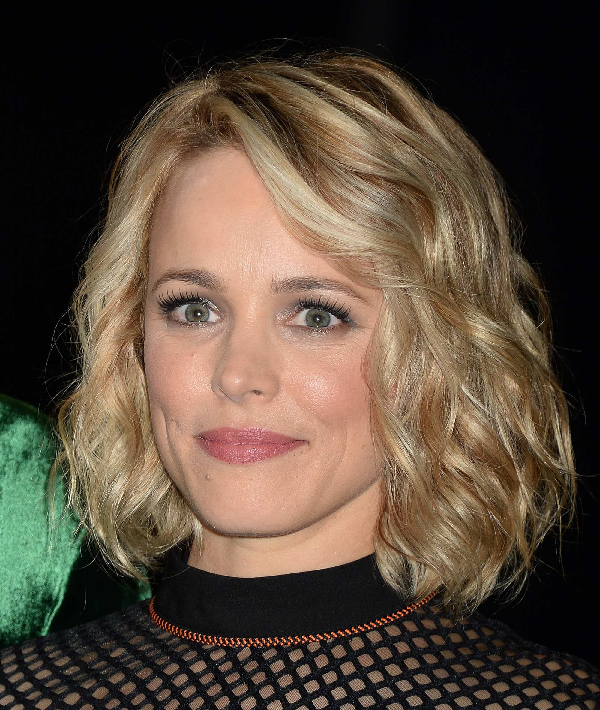 Rachel McAdams with curly bob wearing all black