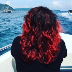 red highlights on black hair curly hairstyle
