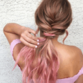 back view of a girl with pink and blonde hair in a mini fishtail braid - prom hairstyles for long hair