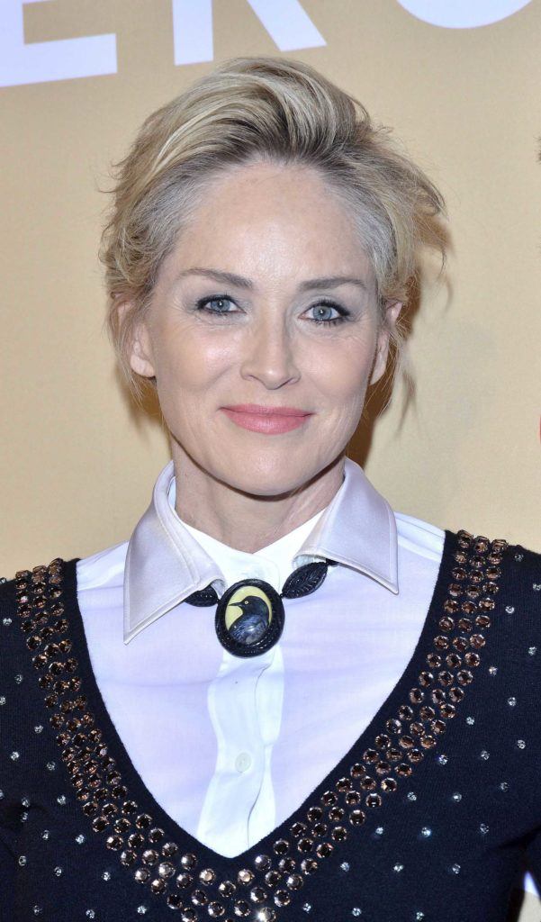 Sharon Stone on the red carpet with her short blonde hair styled into a pixie quiff