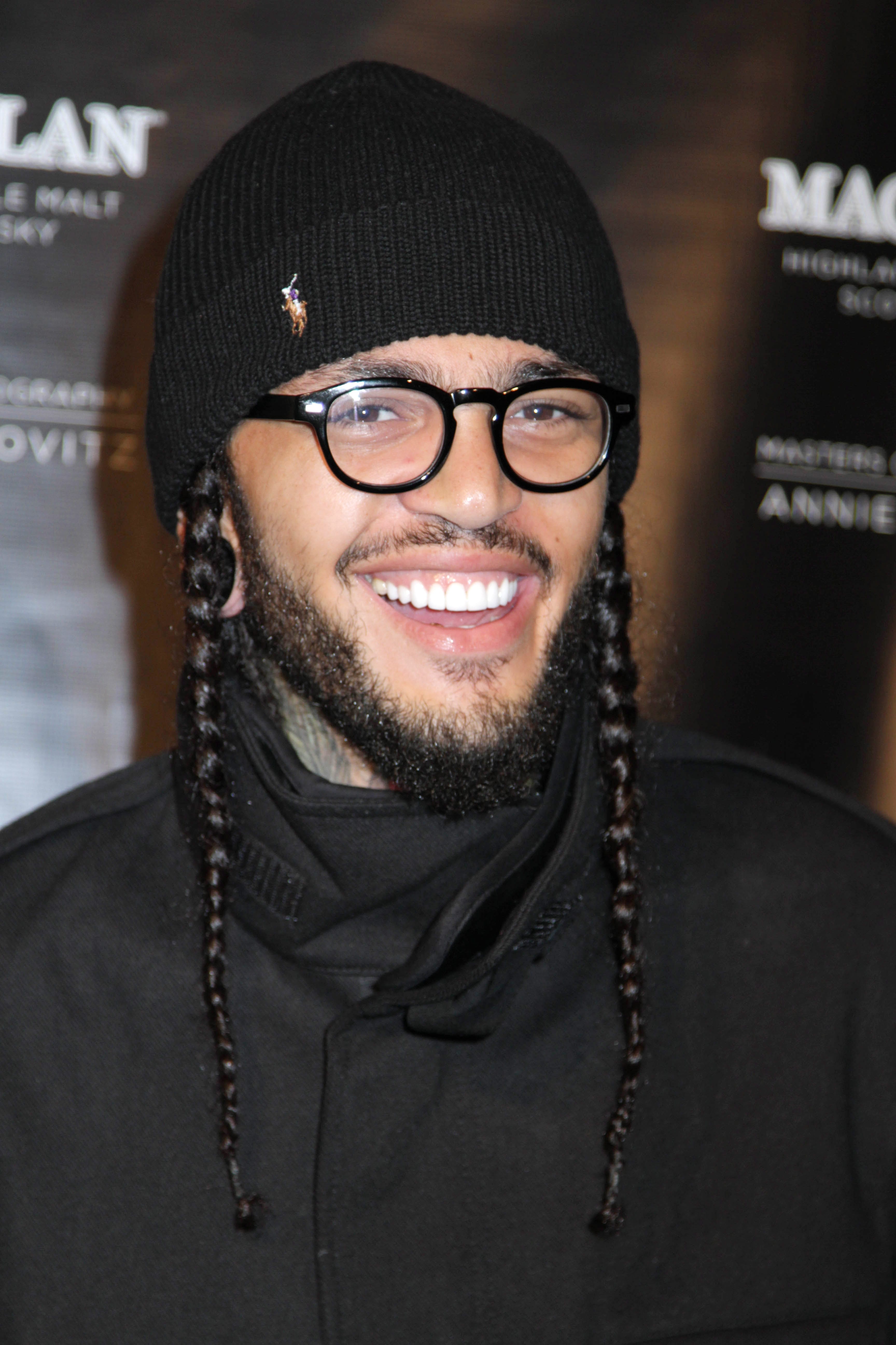 men with braids: All Things Hair - IMAGE - Travie McCoy long braids hat