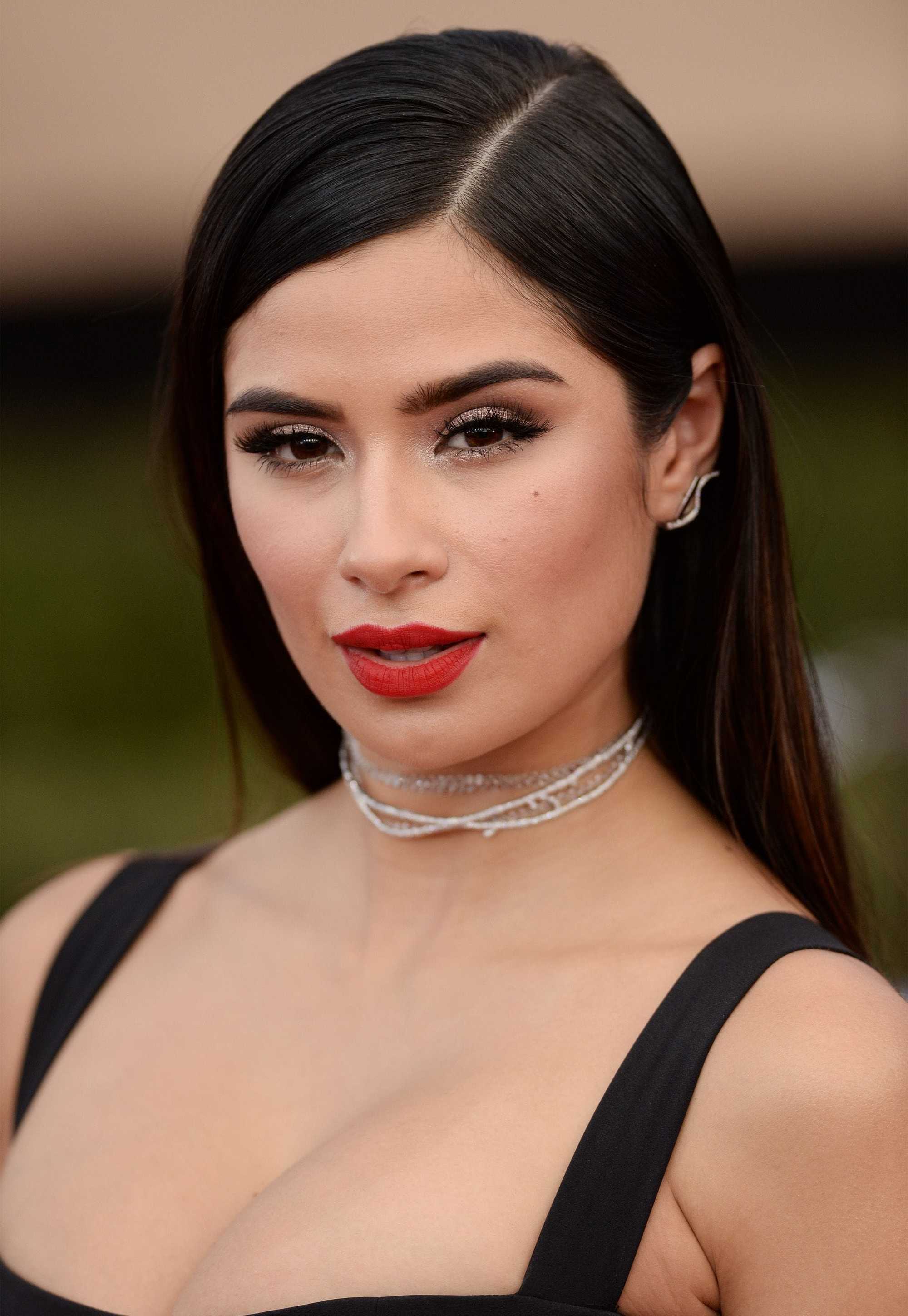 Sexy hairstyles for long hair: Diane Guerrero straight and sleek long brown hair