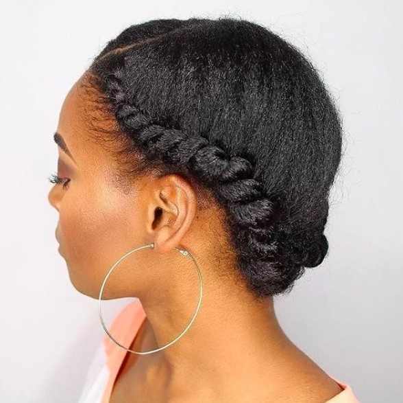 side view of a woman with her hair up - flat twist hairstyles