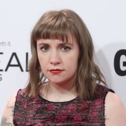 Lena Dunham with brunette hair with bangs