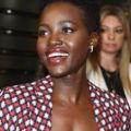 close up shot of lupita nyong'o with high top afro with tapered afro