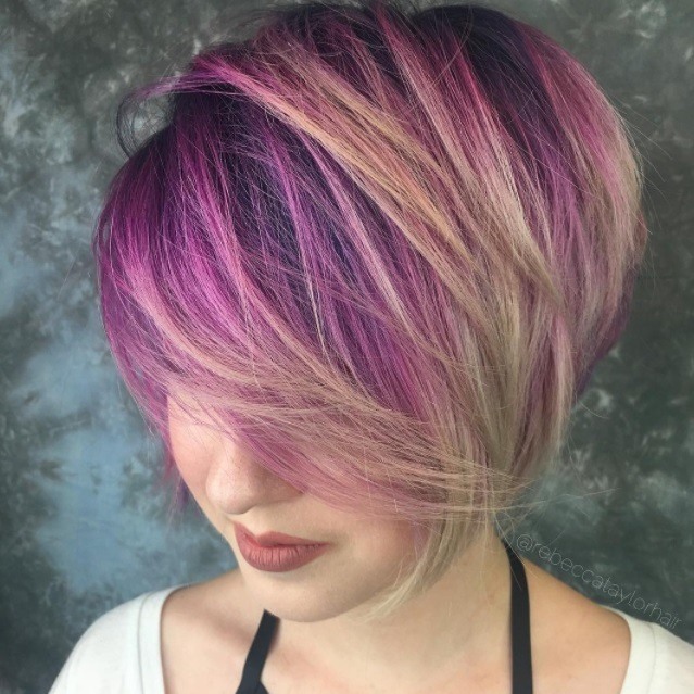 Short ombre hair: woman with reverse short multi-coloured ombre on pixie cut.