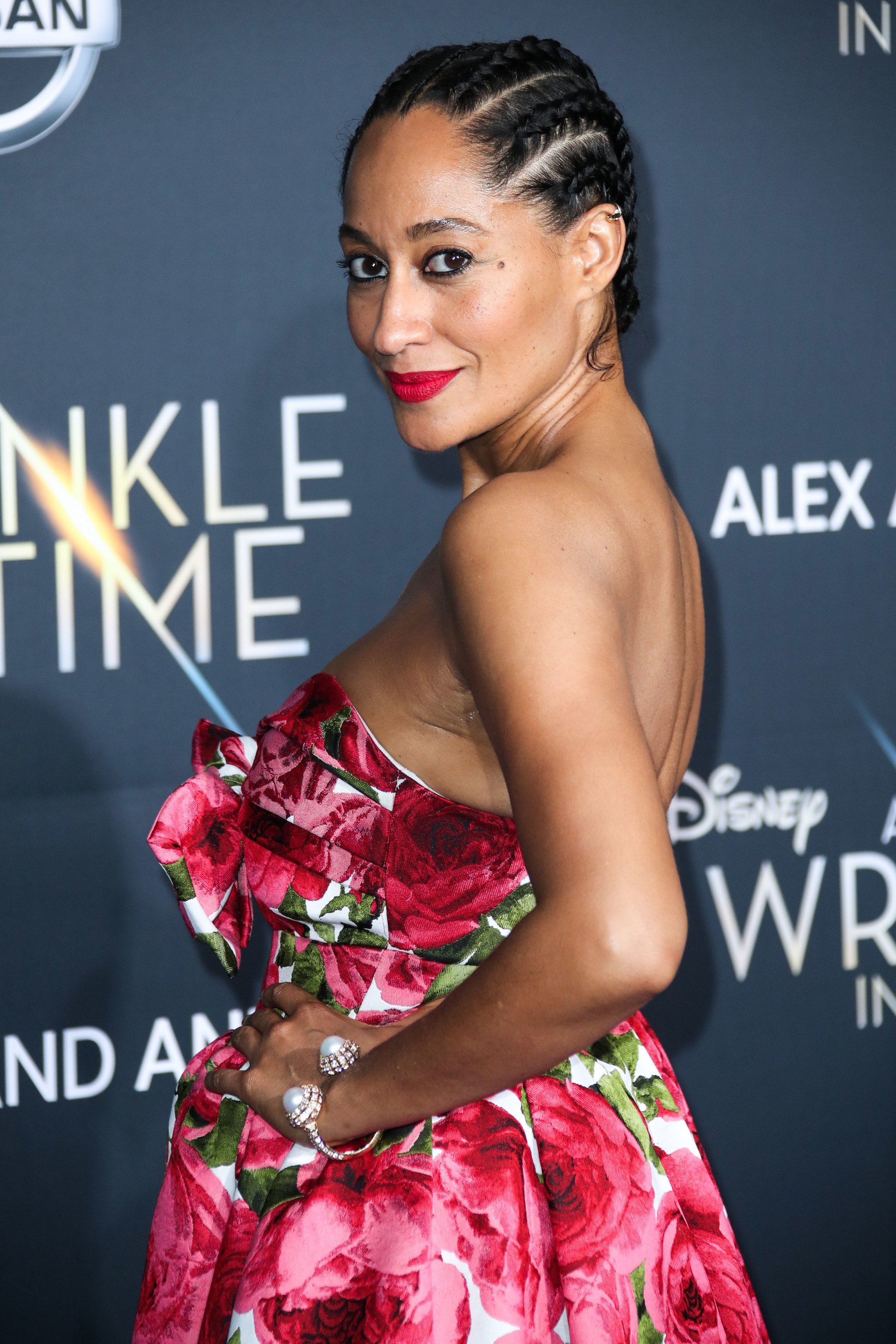 close up shot of tracee ellis ross with straightback cornrows fashioned into a low bun
