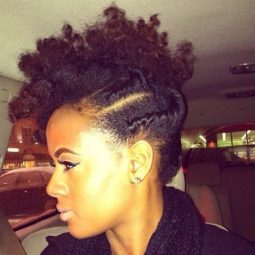 black woman with a natural hair mohawk hairstyle
