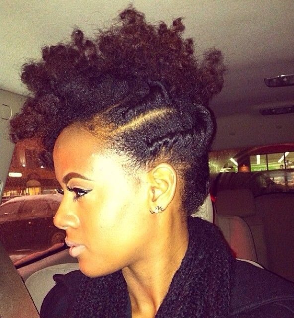 black woman with a natural hair mohawk hairstyle