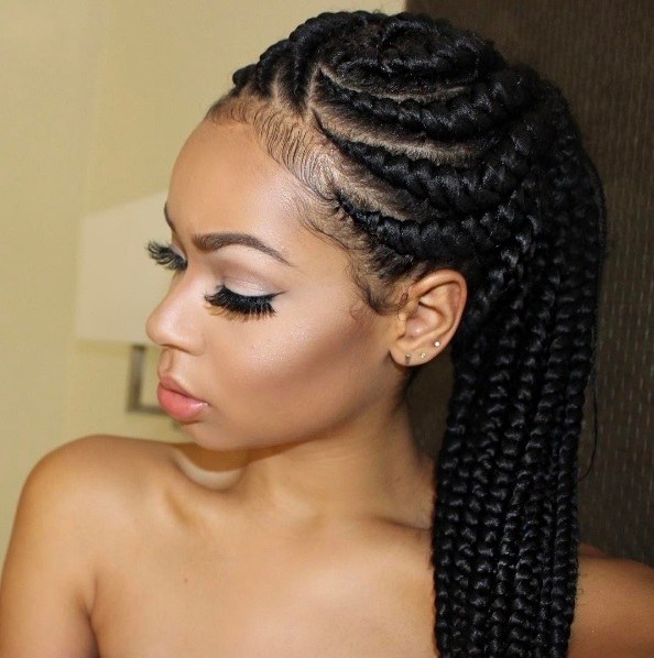 black woman with goddess braids in a ponytail