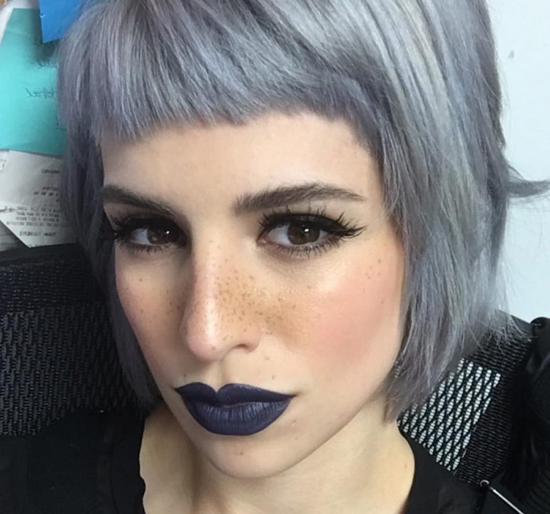 woman with grey silver emo short hair with micro fringe