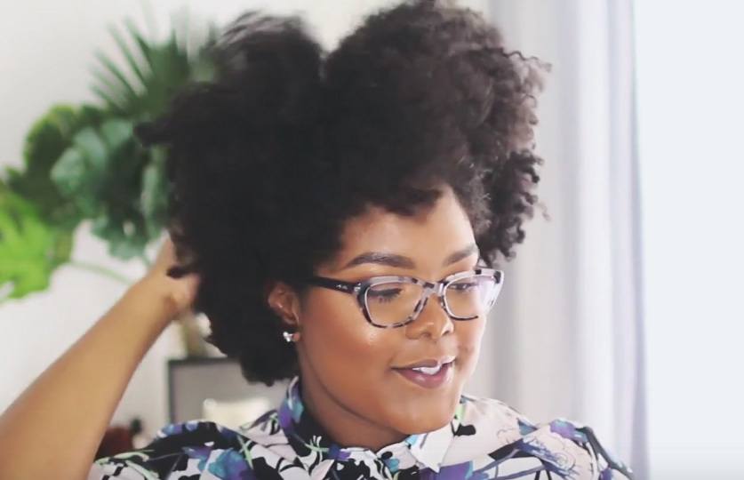 vlogger mini marley with natural hair creating an updo