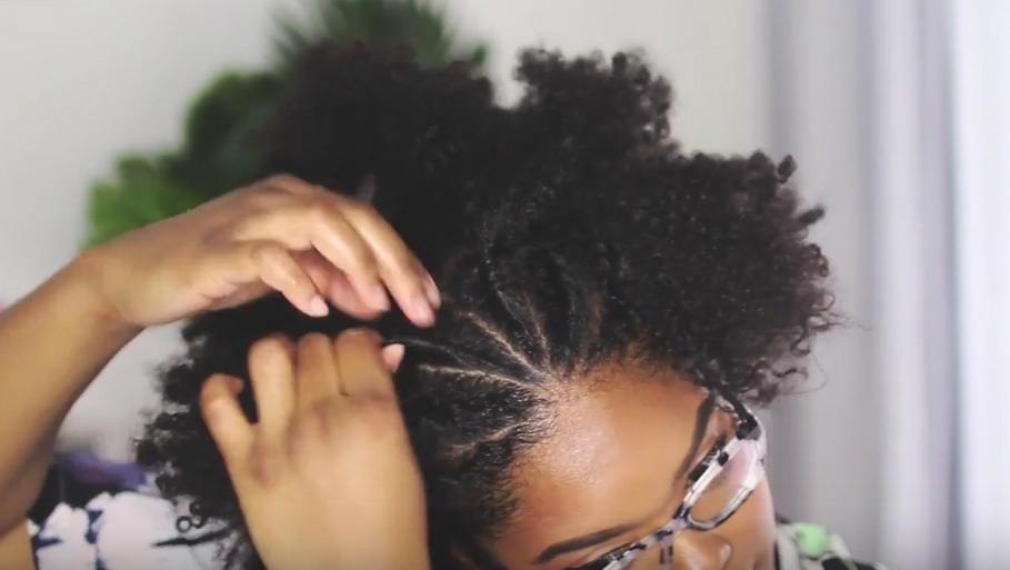 vlogger mini marley close up of natural curly hair being twisted