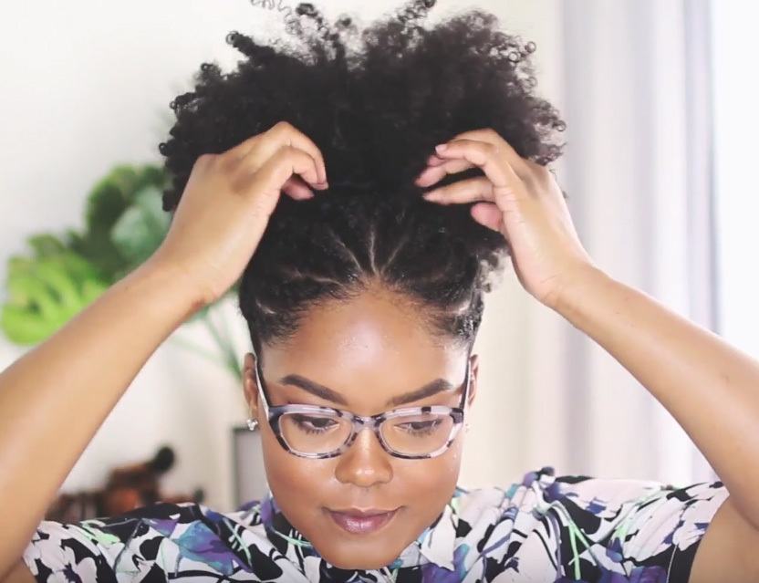 vlogger mini marley with a puff hairstyle with twists