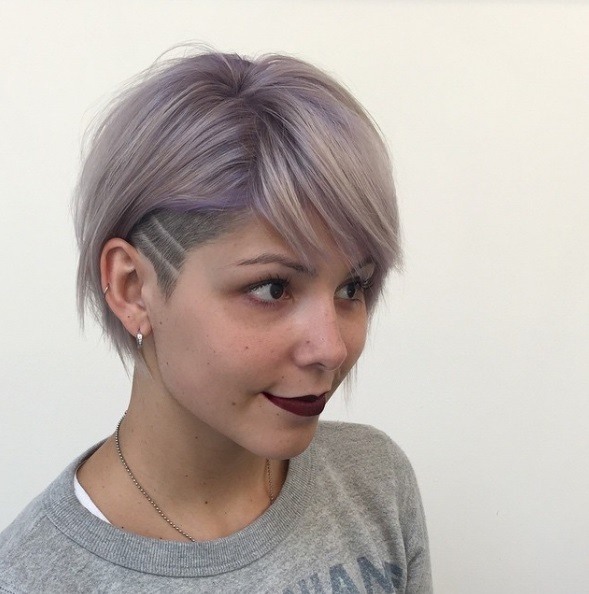 striped undercut designs on woman with lilac hair