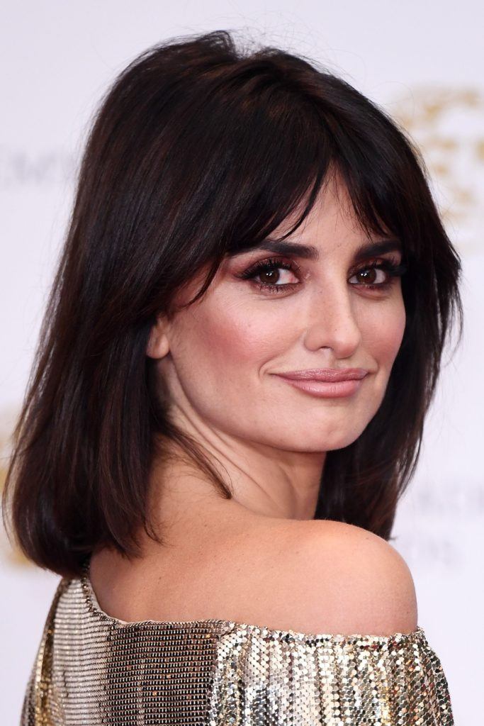 Penelope Cruz with her brunette long bob and fringe style on the red carpet