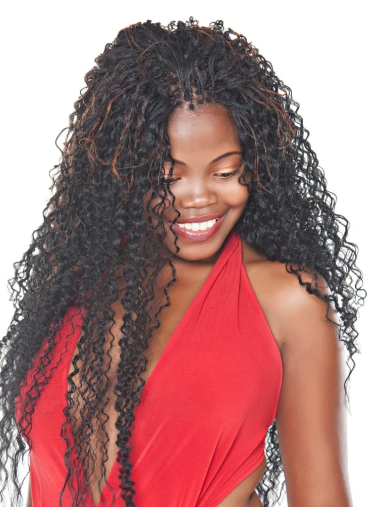tree braids hairstyles: black woman with pick and drop micro braids with curly ends