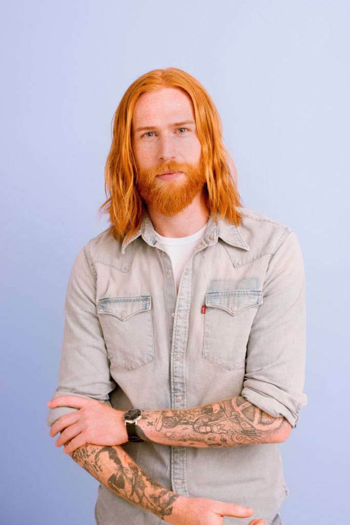Gwilym C Pugh's slick and flicked hairstyle. Finished look