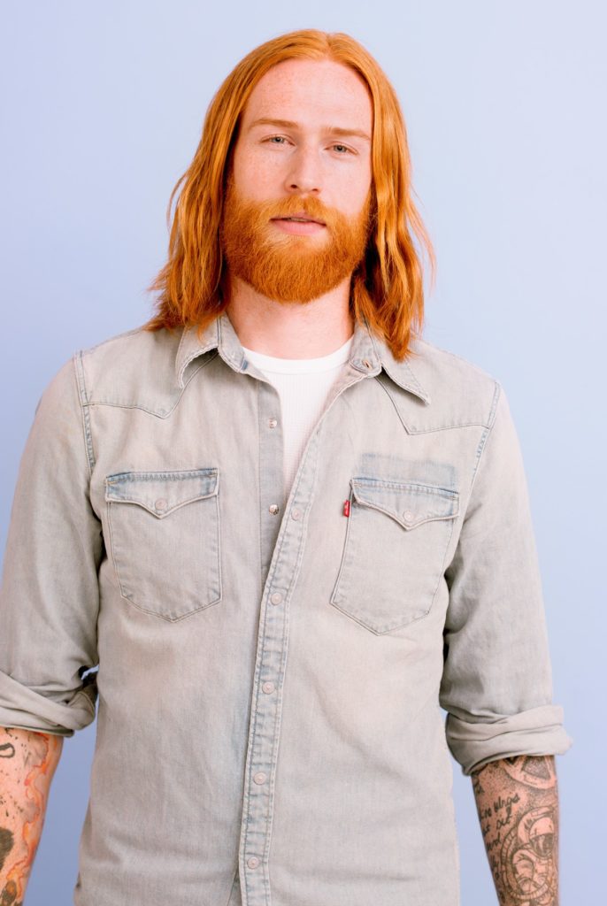 Gwilym C Pugh's slick and flicked hairstyle. Step 1.