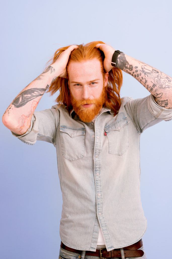 Gwilym C Pugh's slick and flicked hairstyle. Step 2