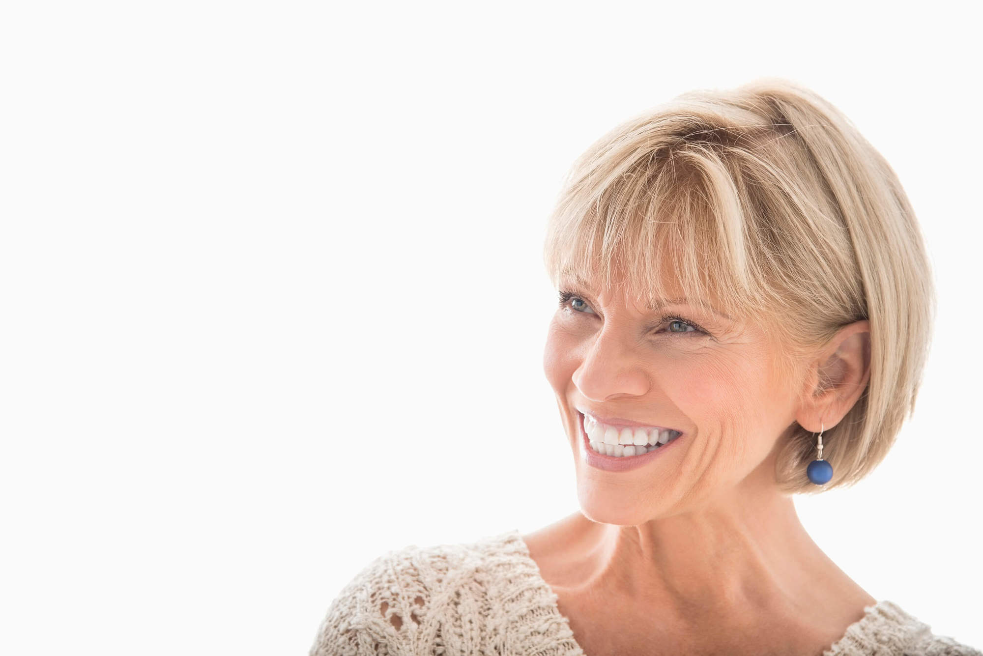 mature blonde woman with a short bob cut with fringe/bangs