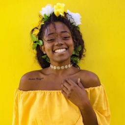 crochet hair styles pictures: when it comes to festival crochet braid styles for black women, incoporating flowers into your hair, as this model shows, is the way forward.