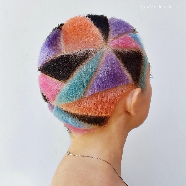 woman with a colourful geometric buzz cut