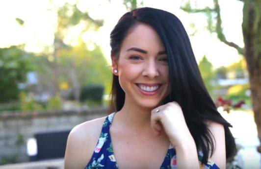 youtube vlogger nikki phillippi with her brunette hair in a straight long bob hairstyle