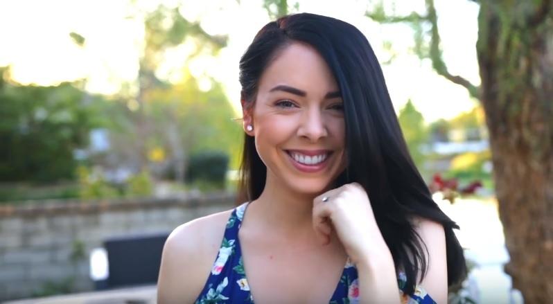 youtube vlogger nikki phillippi with her brunette hair in a straight long bob hairstyle