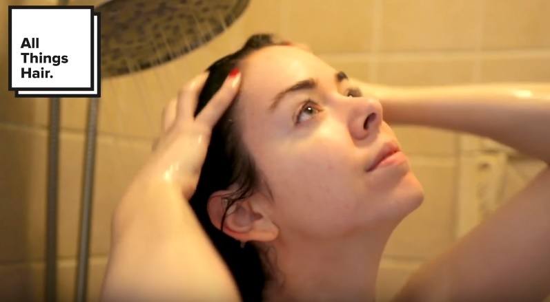 youtuber Nikki Phillippi washing her hair