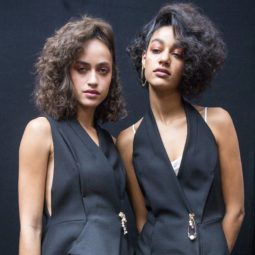 models backstage at topshop unique with short permed hair