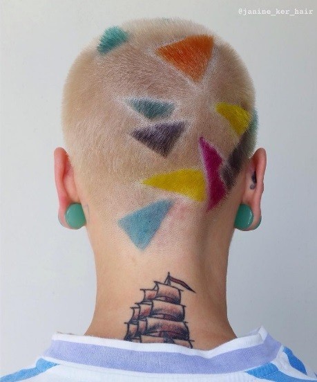 woman with a triangle print coloured buzz cut
