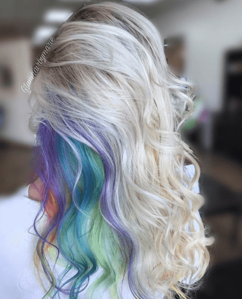 back view image of a woman with long blonde hair and a secret rainbow - long hairstyles 2017
