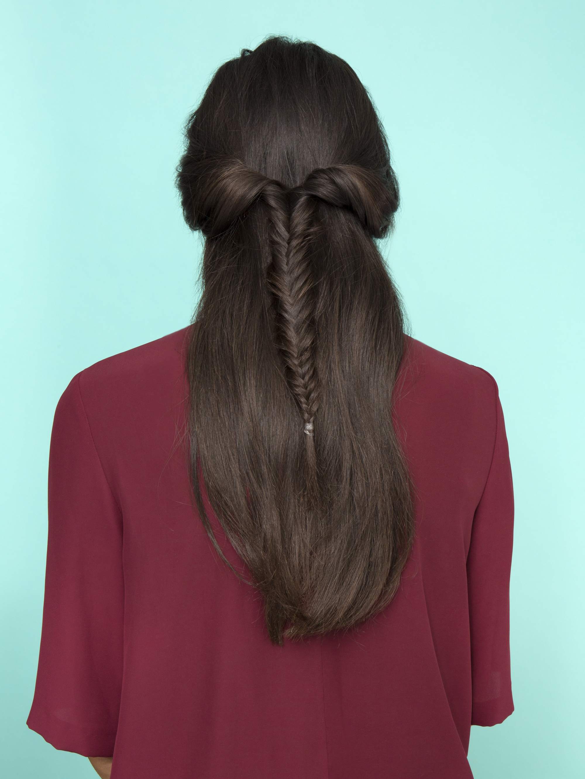 Long dark brown hair with half,up fishtail braid