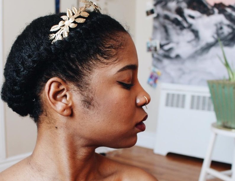 halo braid african american hair: model with natural halo braid hair with gold accessory