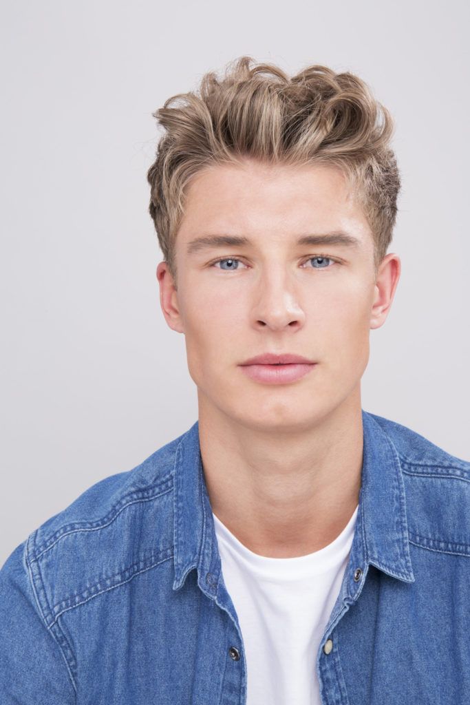 blonde male model with curly quiff hair
