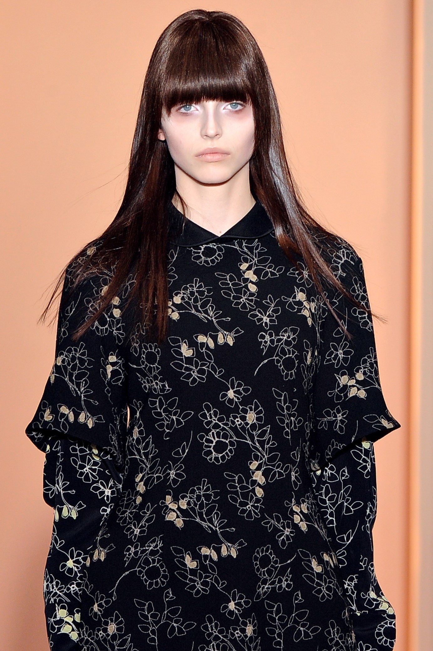 brunette marni model with a blunt full fringe