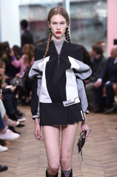 model on the prada resort runway with pigtails hairstyle