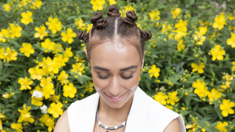 Bantu knots - model with brown hair with bantu knots all over as final look of tutorial