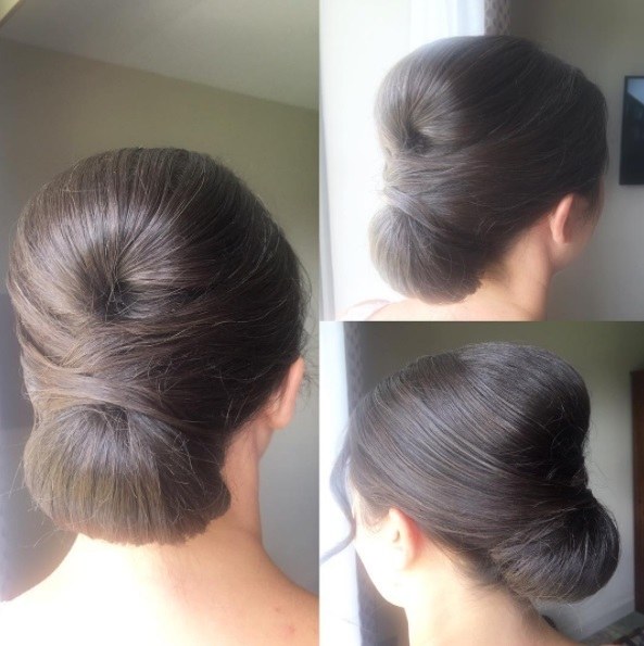 brunette woman with a bouffant bun wedding updo