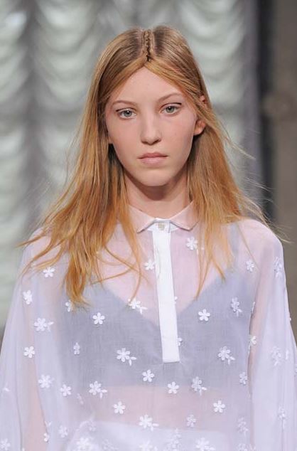 Dark blonde model with braid down her centre parting - indigitalimages