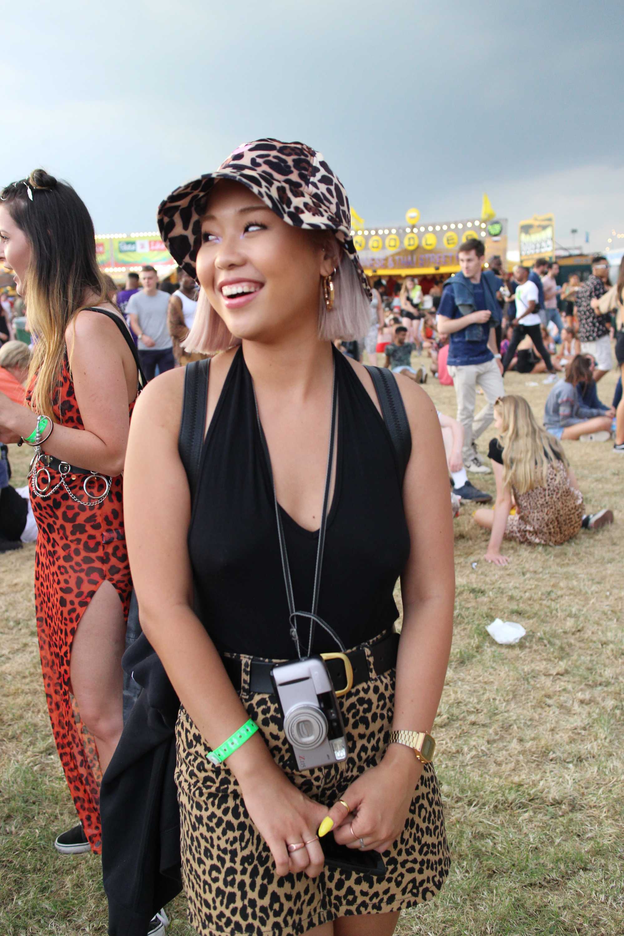 Festival hair accessories: Woman at Lovebox 2018 with a sharp bob length hair worn with a bucket hat