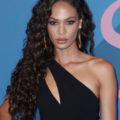 Joan smalls chocolate hair colour styled into curls at CFDA fashion awards