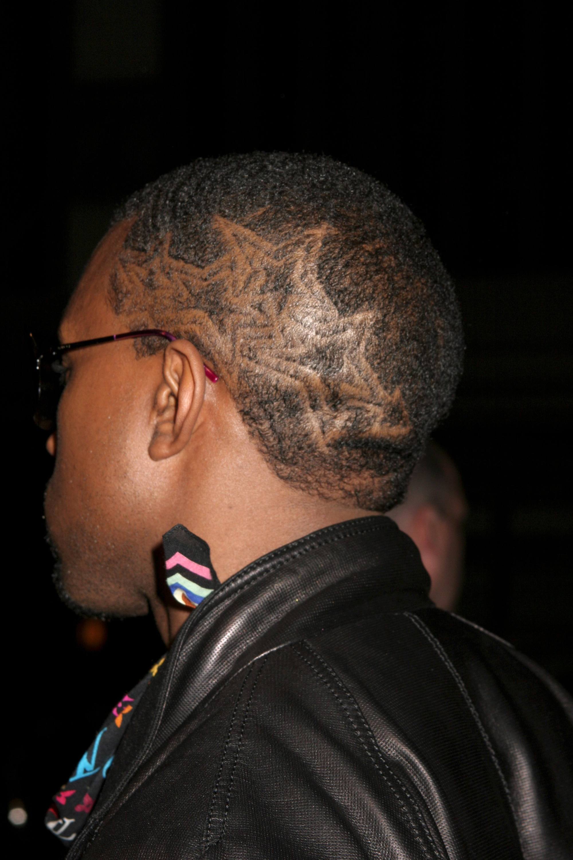 Kanye West in 2006 with shaven star pattern on the side of his head