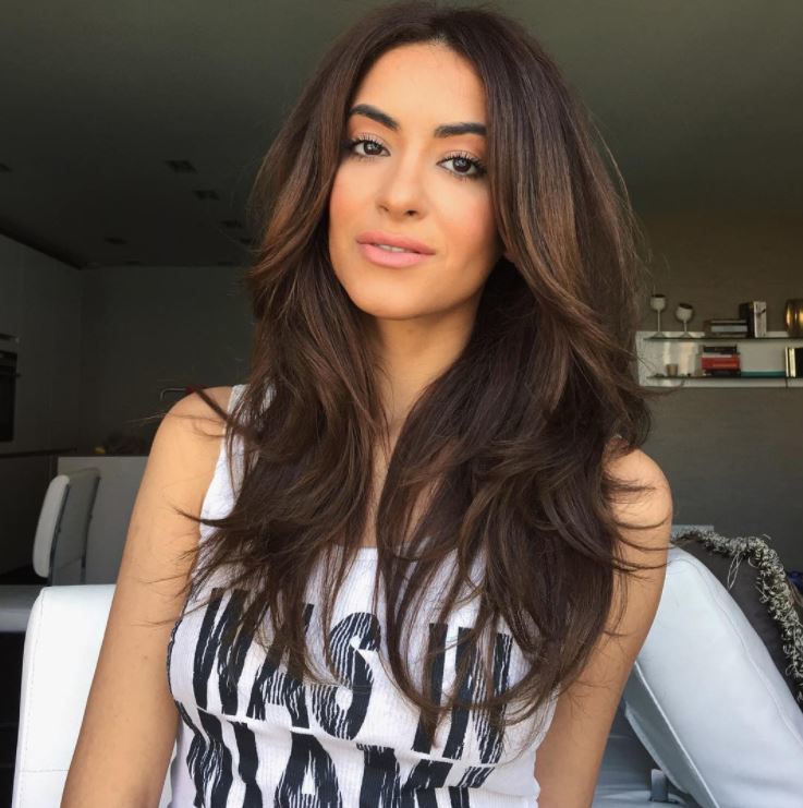 Face shapes - lond brown hair with big loose waves and grown out flicked out bangs