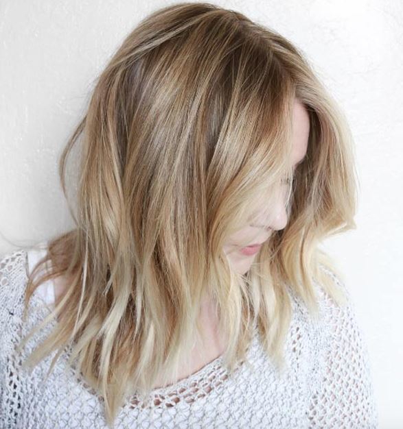 Face shapes - medium length long bob hairstyle with wispy ends and soft waves
