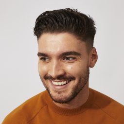 Man with brown messy quiff hairstyle