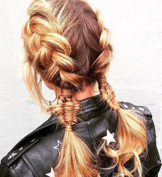 back view of a woman with blonde hair and double dutch braid style with fishtail braid