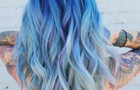 Ocean hair colour - Mid to light blue ombre hair colour on long wavy hair