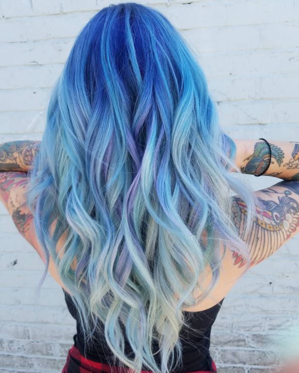 Ocean hair colour - Mid to light blue ombre hair colour on long wavy hair